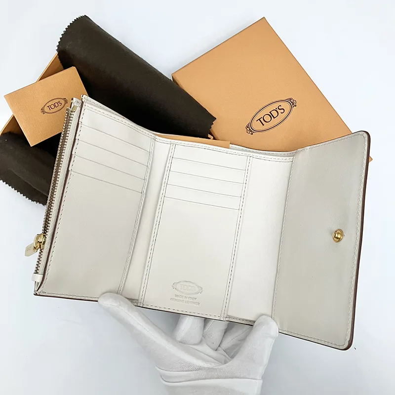 トッズ スーパーコピー Tタイムレス 三つ折り財布 3色 XAWCHNB3300KETS203